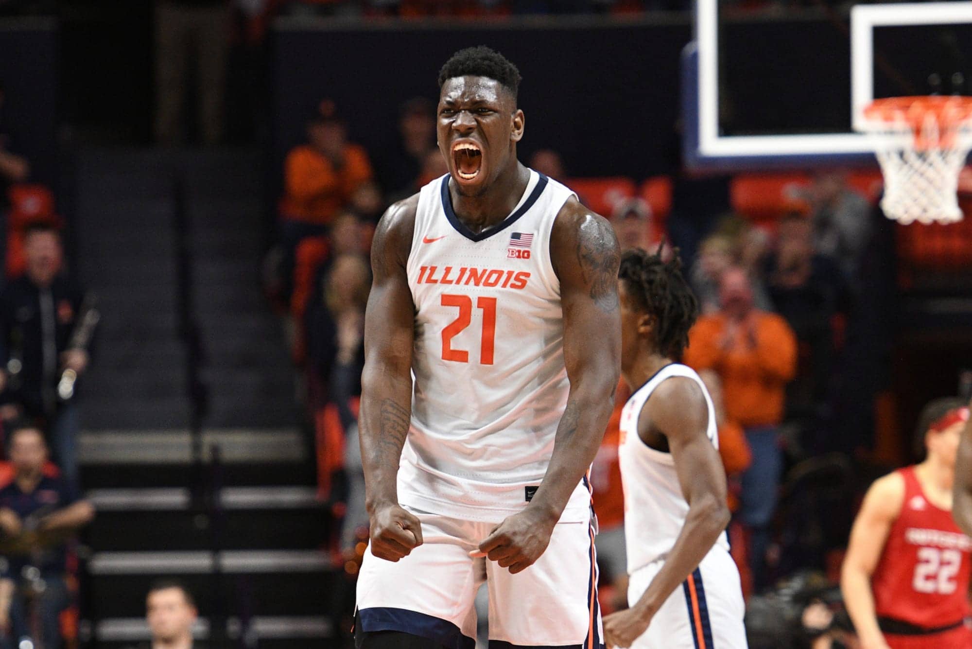 Illinois Fighting Illini basketball player yelling and flexing in celebration