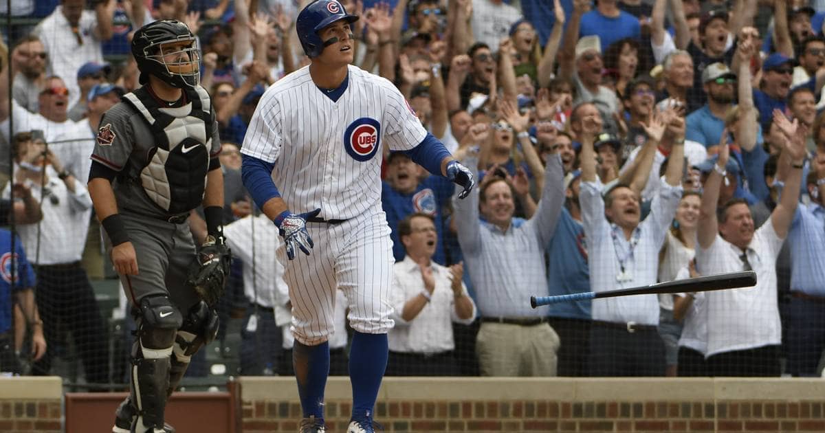 Chicago Cubs player, Anthony Rizzo, flips bat while watching homerun ball